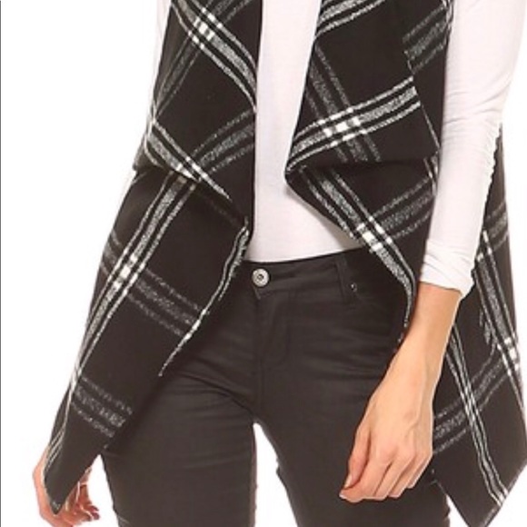 Black and white vest. - Picture 2 of 5